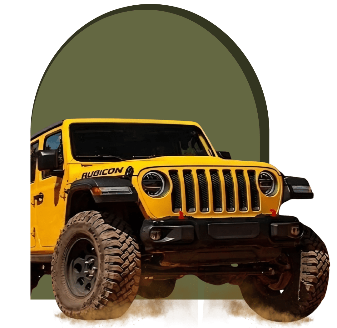 Yellow off-road vehicle with rugged tires on a green arch background.